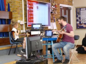 Tom Hunt helping organise the first ever concert at Heathlands Deaf School.